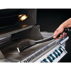 Napoleon Industrial Stainless Steel Grill Brush -Napoleon Grills Hub Low Res JPG 62052 IndustrialSSCleaningBrush WithScraper InUse Hook