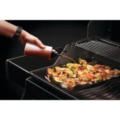 Napoleon 2-Piece 16oz Squeeze Bottles -Napoleon Grills Hub Low Res JPG 70058 Griddle Squeeze Bottles InUse Option2